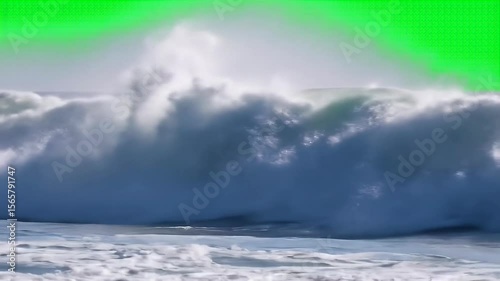 A green screen with a wave in the ocean