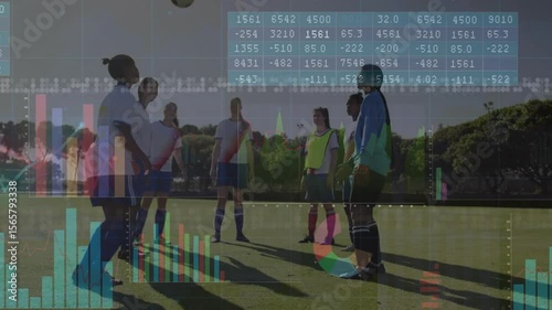 Women soccer players circling stepping forward juggling ball displaying charts in sports training photo