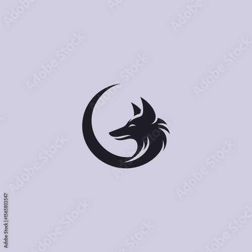 Jackal and moon logo in clean and mystical silhouette design.