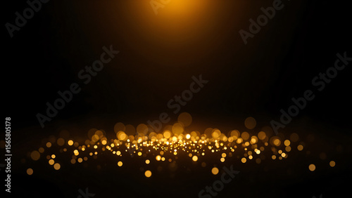 Blurred Particles and Golden Defocused Lights over Black Background