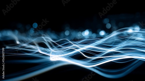 Abstract glowing blue and white lines on dark background, representing digital data flow and connectivity.
