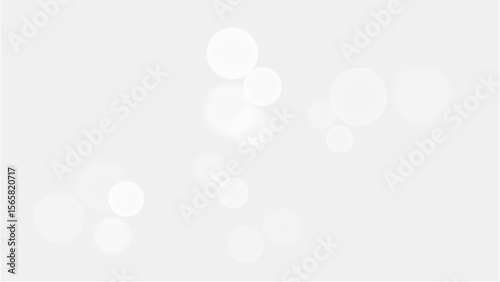 Transparent background: Subtle white bokeh lights floating against a light gray or white backdrop.