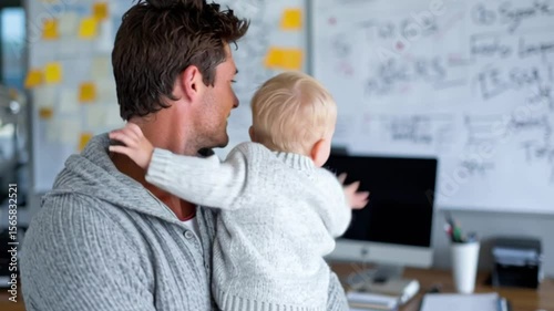 Father holds baby in cozy environment, showcasing a tender moment full of love and connection
