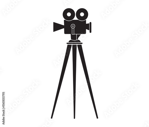 Silhouette of an old movie camera on a tripod. Vintage movie camera on tripod silhouette.