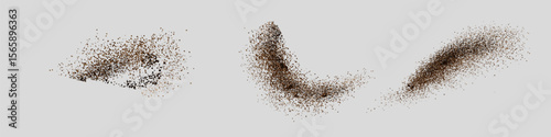 Flying coffee or chocolate powder, dust particles in motion, ground splash isolated on light background.