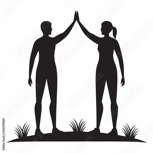 Man and woman silhouette giving high five celebrating success together outdoors