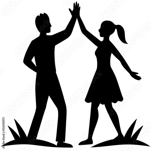 Man and woman silhouette giving high five in celebration outdoors