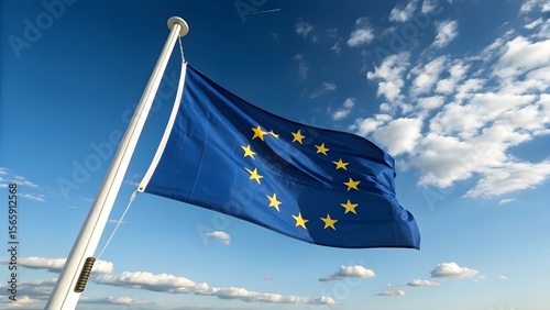 European Union Flag Waving in the Wind Against Clear Blue Sky