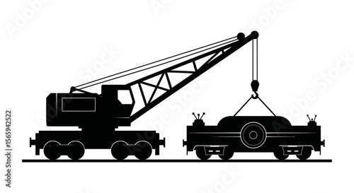 Silhouette of a crane lifting a large object onto a flatbed railcar.
