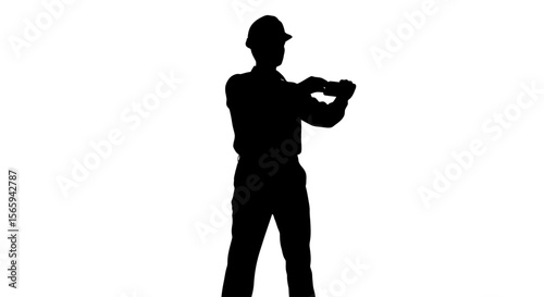 Silhouette of a construction worker stretching arms, wearing a hard hat.