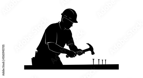 Silhouette of a construction worker hammering nails into a plank of wood, wearing a hard hat.