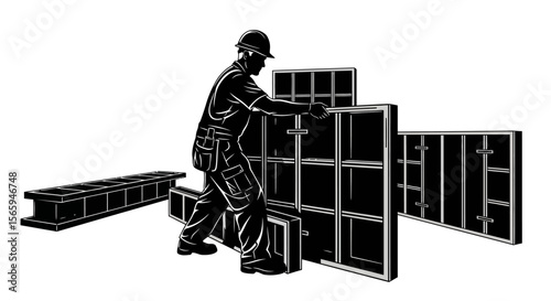 Construction worker maneuvering large formwork panels for concrete pouring.