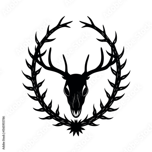 deer skull nestled in thorns and vine wreath