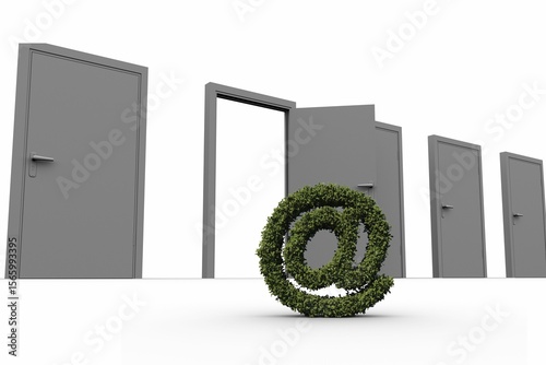 At sign of topiary against doors
