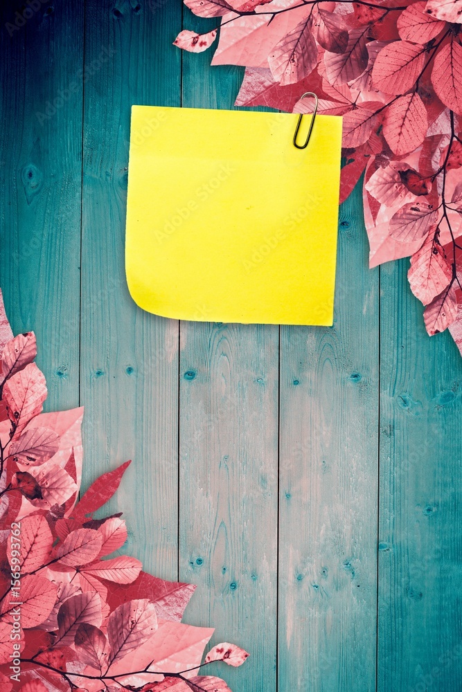 Naklejka premium Autumn leaves with yellow note