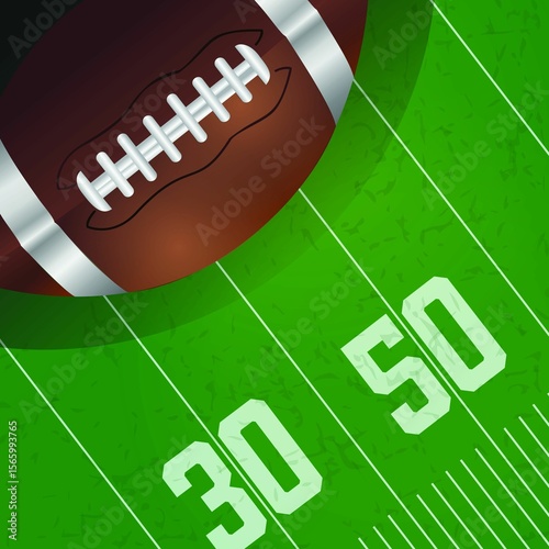 Image of american football ball over green field