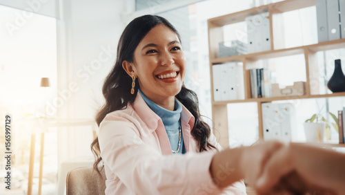 Happy, business woman and meeting with handshake for partnership, agreement or deal in workplace. Female person, employee or shaking hands with smile for introduction, recruiting or hiring in office