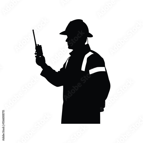 Silhouette of a Firefighter Communicating with Radio in High Visibility Gear