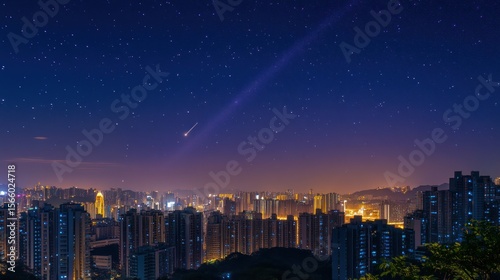 Night cityscape with a meteor streaking across a star-filled sky