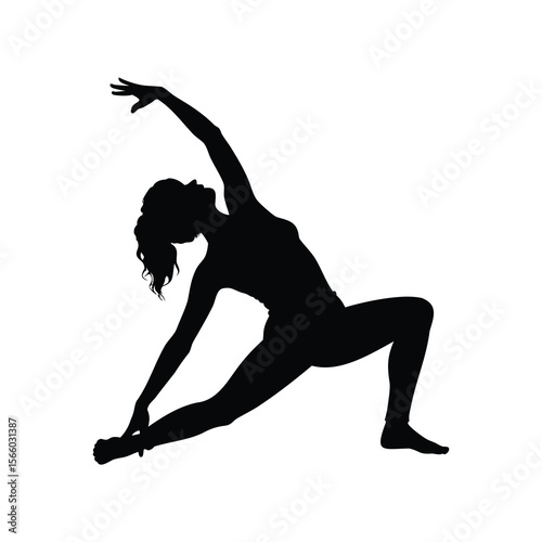 Silhouette of a woman in a yoga pose, extended side angle pose