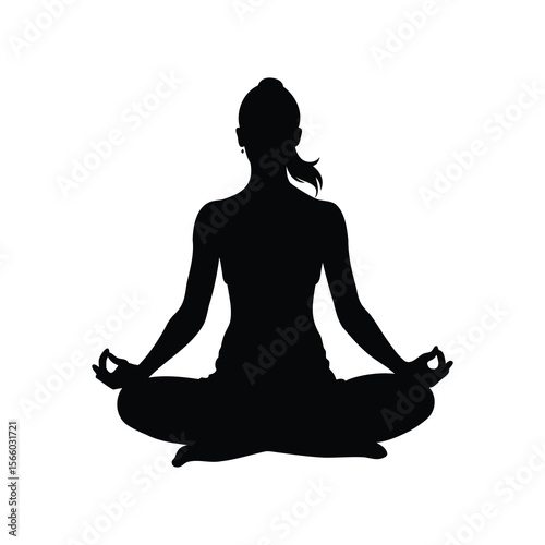 Silhouette of a woman in lotus pose meditating, practicing yoga for calmness