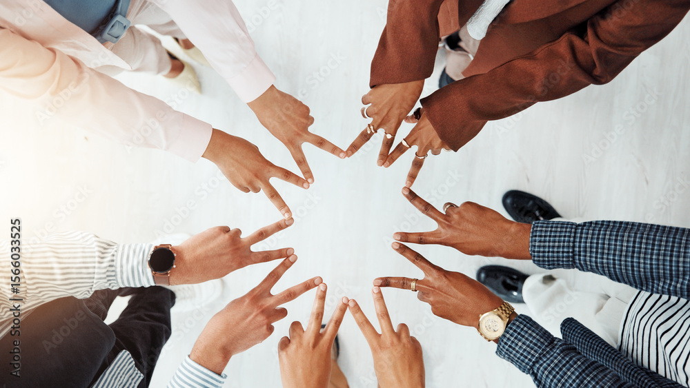 Obraz premium Business people, meeting and top view of star with hands, collaboration or team building. Above, community or group of employees with fingers in office for synergy, strategy or solidarity together