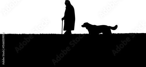 silhouette of a elder man and his pet dog