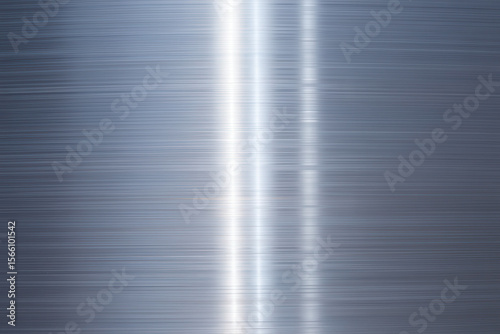 A close up view of a brushed metal surface with bright vertical light reflections creating texture and depth
