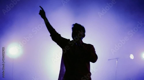 Silhouette speaker on stage