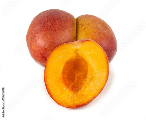 Ripe Whole and Halved Peaches Isolated on White Background – Juicy Organic Summer Fruit for Healthy Eating, Macro Close-Up Collection