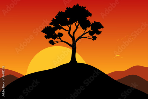silhouetted tree on a hilltop at sunset
