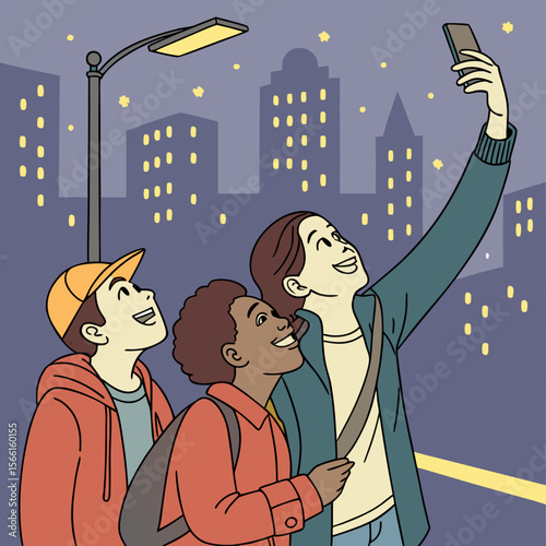 Three friends taking a selfie at night in a city with buildings and a street light shining above them