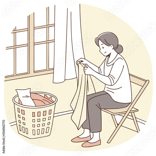 Illustration of a woman sitting on a chair folding laundry near a window and a laundry basket indoors