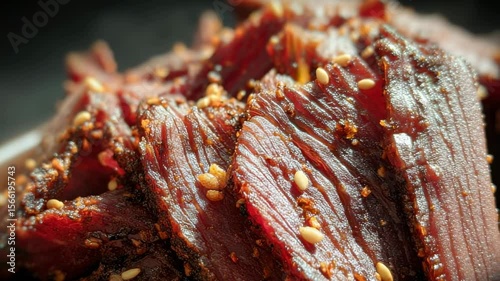 Tender and flavorful beef jerky preparation in a cozy kitchen setting with spices and sesame