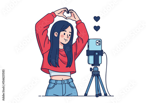 Smiling Girl Making Heart Shape with Hands Vlogging with Smartphone.