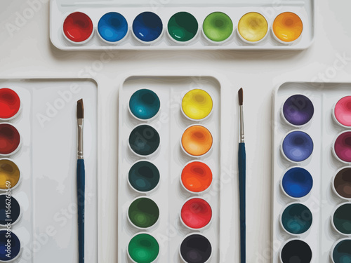 Art supplies for painting with multiple watercolor paint palettes and brushes