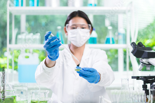 Scientist conducted research in biotechnology, using organic elements from nature to drive innovation and support the development of healthier food, Laboratory concept.