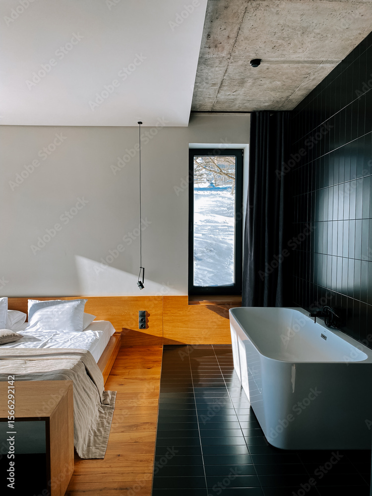 Fototapeta premium Modern bathroom and bedroom design in mountain retreat featuring natural light and sleek finishes