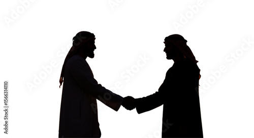 Silhouette of two men in traditional arab clothing shaking hands against a white background image view