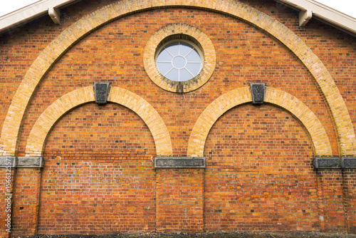 Curved brickwork and arches on a building