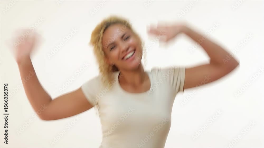 Joyful woman exuberantly celebrating her success with a triumphant shout Joyful woman exuberantly celebrating her success with a triumphant shout
