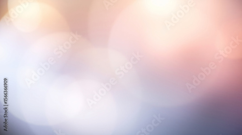 Abstract bokeh background with soft blur and gentle glowing light effects.