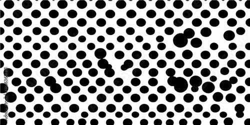 Seamless black and white dotted pattern vector illustration for animal print design or modern textile art