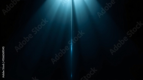 A focused beam of light creating a dramatic and mysterious atmosphere on a dark background.