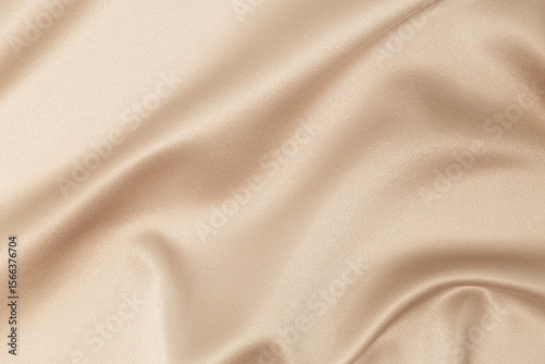 beige silk fabric background with folds