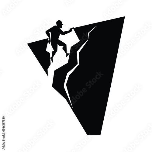 Black silhouette of climber ascending steep rock face