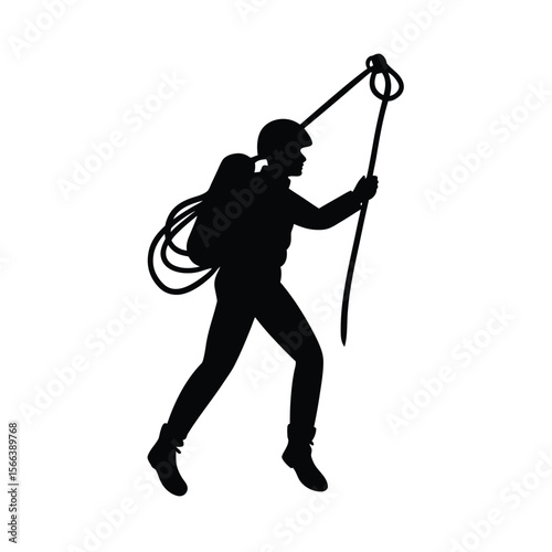 Black silhouette of climber with rope and helmet climbing