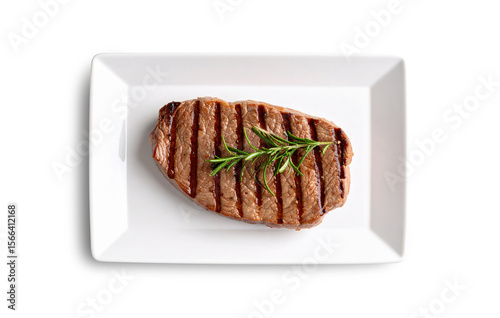 Grilled beef steak with rosemary on white rectangular plate, transparent background