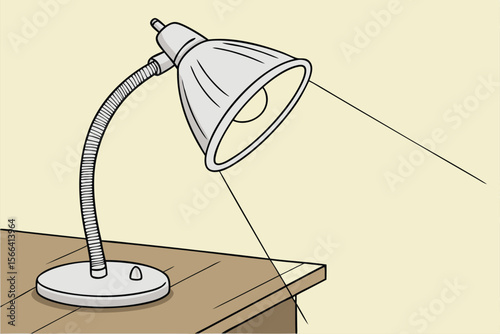 Gray desk lamp with flexible neck on wooden surface