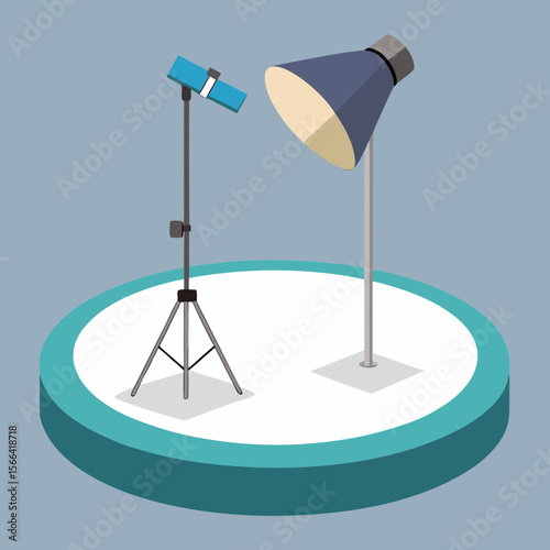 Two studio lights on stands on a circular stage with a blue background